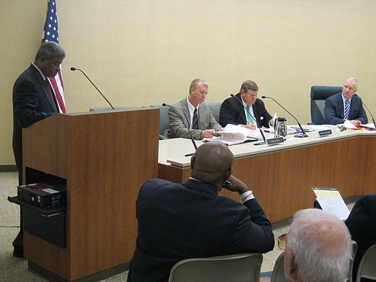 Jacksonville Transportation Authority Executive Director Michael Blaylock issues his monthly report to JTA board members Thursday. Members Greg Evans, Florida Department of Transportation District 2 secretary, Scott McCaleb, and Chairman Ed Burr liste...