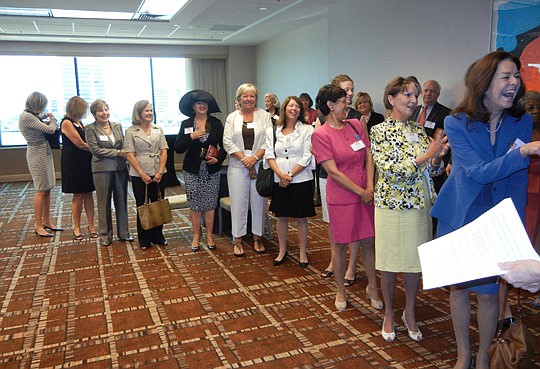 Dale Regan (above, second from right) was honored at the 2011 EVE Awards presented by The Florida Times-Union.