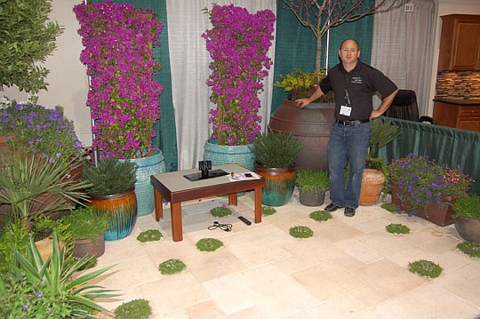 Photos by Max Marbut - Mike Farnsworth from Cascade Outdoor Design is showing a "living patio" at the Jacksonville Home &amp; Patio Show through Sunday at the Osborn Center.