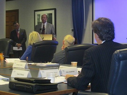 JAXUSA Partnership President Jerry Mallot discusses the Bi-Lo Winn-Dixie headquarters deal Wednesday with Jacksonville Economic Development Commission board members.