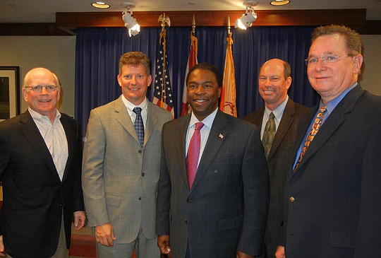 Photo by Karen Brune Mathis - From left, Jacksonville Civic Council Chairman Peter Rummell, City Council President Stephen Joost, Mayor Alvin Brown, JAXUSA Partnership President Jerry Mallot and JAX Chamber President Wally Lee after they presented the...