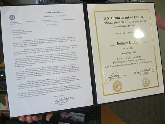 Photo by David Chapman - Day's certificates of graduation from the FBI Citizens' Academy, signed by FBI Director Robert Mueller III. "It was really cool," Day said of the program.