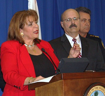 Photo by Joe Wilhelm Jr. - State Attorney Angela Corey, Assistant State Attorney Bernie de la Rionda and Undersheriff Dwain Senterfitt.