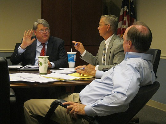 Photo by David Chapman - Council member Robin Lumb (left) poses a question to Council members Doyle Carter and Matt Schellenberg during Tuesday's Council Recreation, Community Development, Public Health and Safety subcommittee meeting.