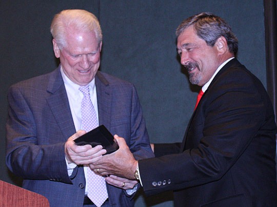 Photo by Joe Wilhelm Jr. - Financial News &amp; Daily Record "Lawyer of the Year" recipient George Gabel, of Holland &amp; Knight, is presented the award by Daily Record Publisher Jim Bailey at The JBA Law Day Luncheon April 11.