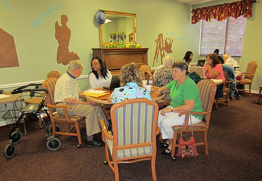 Area attorneys assist seniors at Riverside Presbyterian House prepare advance directive documents.