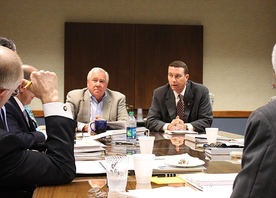 Photo by Joe  Wilhelm Jr. - Mike Barrett and Mike Pattillo, both of Ernst &amp; Young, provide an industry update Monday to the JEA Finance and Audit Committee.