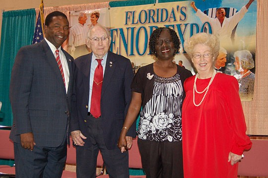 Photos by Max Marbut - Mayor Alvin Brown with 2012 Senior Citizens Award winners (from left) Glenn E. Johnson, Priscilla Davis and Anne Knight.