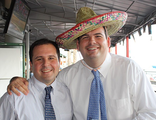 Photos by Joe Wilhelm Jr. - Hispanic Bar Association of Northeast Florida President Ricardo Bedoya of Holland &amp; Knight and The JBA Young Lawyers Section board of governors member Eric Roberson of Jason K.S. Porter, at the Diez de Mayo happy hour h...