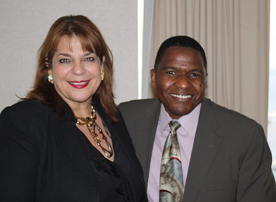 Photos by Joe Wilhelm Jr. - State Attorney Angela Corey and Duval County Judge Mose Floyd at the Jacksonville Women Lawyers Association meeting Thursday.