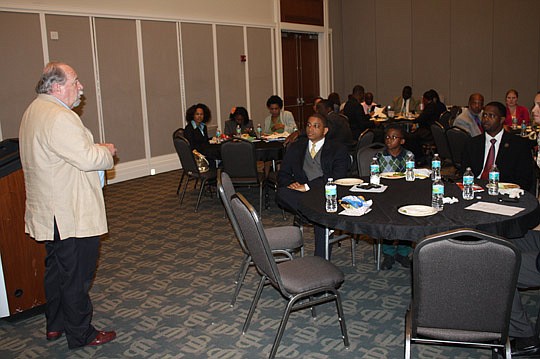 Photos by Joe Wilhelm Jr. - Grymes, CEO of Big Brothers Big Sisters of Northeast Florida, talked about what his organization does to help children in the community.