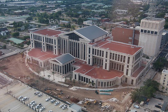 Photo by Max Marbut - As this May 8 photograph of the new Duval County Courthouse shows, trees already have been planted on the site, even though the landscape plan has not yet been approved by the City. That was just one of the questions raised Monda...