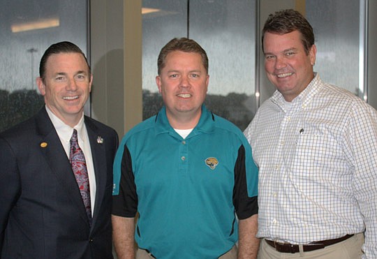 Photos by Joe Wilhelm Jr. - The Jacksonville Bar Association past President Dan Bean, The JBA President-elect Ray Driver and Jaguars Senior Vice President of Sales and Marketing Macky Weaver Friday at EverBank Field for The JBA Paws and Laws III. The ...