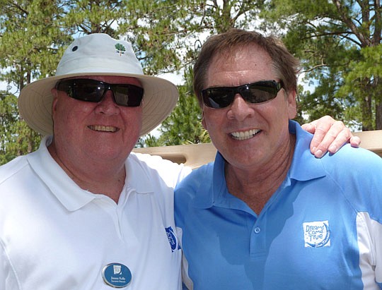 Dreams Come True Executive Director Jimmy Kelly and WJXT TV-4  Sports Director Sam Kouvaris at the 11th Annual Sam Kouvaris Dreams Come True Golf Tournament. The event raised more than $120,000. Read the story below.