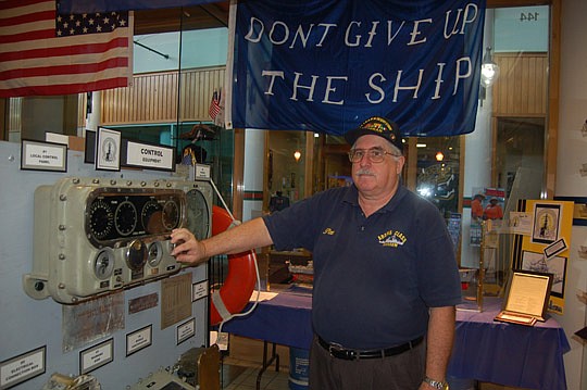 Photo by Max Marbut - Retired U.S. Navy Master Chief Pat Stroud manages the Adams Class Naval Ship Museum Store at the Landing Downtown. He's also a member of the board of directors of the Jacksonville Historic Naval Ship Association, the organization...