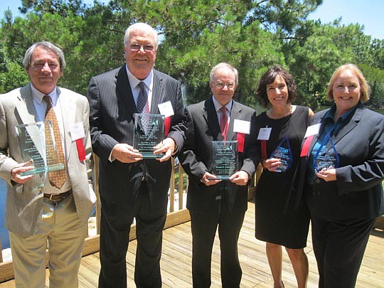 Photo by David Chapman - Small Business Week award winners Anthony Marlow, Ronald Rose, Charles Armstrong, Ann Sabbag and Joanne Jolin at the 20th Annual Small Business Week celebration Thursday at the University of North Florida.