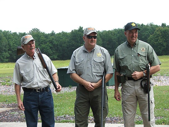 From left, Jacksonville Sheriff John Rutherford, Bradford County Sheriff Gordon Smith and Clay County Sheriff Rick Beseler were three of the participants at the Jacksonville Gun Club May 18 in the "Shoot for Justice" skeet, five stand and trap competi...