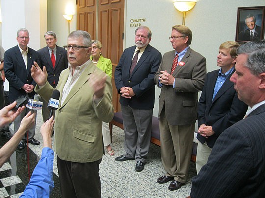 Photo by David Chapman - Former City Council President Bill Basford (front) speaks Tuesday about the reasons he supports a bill to ban discrimination based on sexual orientation. He is joined (from left) by former Council presidents Terry Wood, Jim Ov...