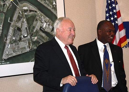 Photo by Joe Wilhelm Jr. - Jacksonville Port Authority Board Vice Chairman Stephen Busey and Chairman Reggie Gaffney before Gaffney informed the board Thursday he would not be seeking a second term as chairman. Busey was elected to succeed Gaffney.