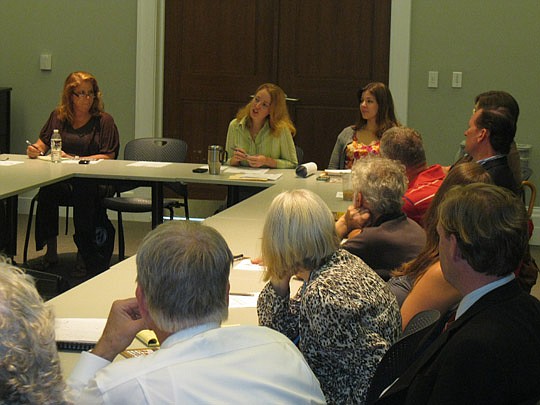 Photo by David Chapman - Amy Harrell, Downtown Vision Inc. director of district services, briefs attendees of Wednesday's operations meetings about Downtown. Harrell told the group it will be her last meeting because she is moving to Toronto to be wit...