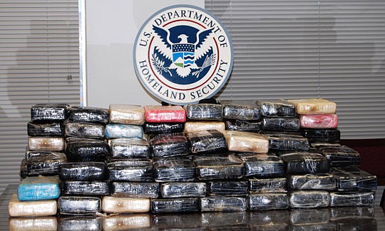 Customs officers discovered 235 pounds of cocaine Tuesday at the port of Jacksonville. The container originated in Chile. No arrests were made immediately.