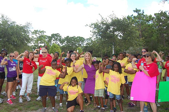 Olympic swimmer Nancy Hogshead-Makar (center) spoke Thursday at the Girls Inc. of Jacksonville "Walking for a Healthier Future" event about training and setting goals. Read the story below.