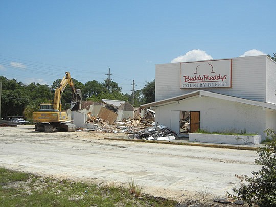 Photos by Karen Brune Mathis - The closed BuddyFreddys at 7700 Merrill Road is being demolished for construction of a Dollar General store.