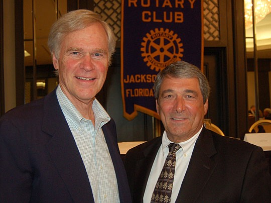 Photos by Max Marbut - U.S. Rep. Ander Crenshaw (left) and Jim Bailey, publisher of the Financial News &amp; Daily Record. Crenshaw was the guest speaker Monday at the Rotary Club of Jacksonville.