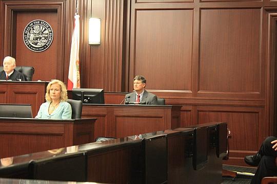 Photo by Joe Wilhelm Jr. - Duval County Clerk of Courts Jim Fuller sits in the witness box during a trial to determine if he is eligible to run for a fourth term with the City of Jacksonville taking the position that he is not due to a recent Florida ...