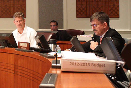 Photo by Joe Wilhelm - City Council Auditor Kirk Sherman (right) explains his office's breakdown Thursday of Mayor Alvin Brown's proposed fiscal 2012-13 budget during the first day of budget hearings by the Council's Finance Committee. City Council me...