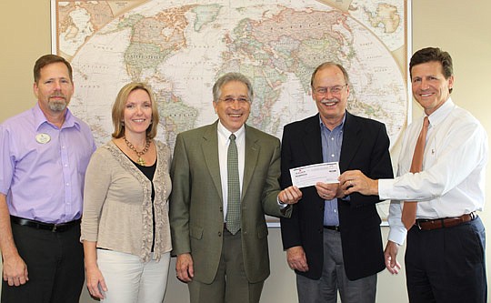 Photo provided by Sauer - Representatives from Sauer present a check to the Office of Student Affairs and The Military and Veterans Resource Center at UNF. Rich Carey, (from left) MVRC transition coach; Kathleen Leone, Student Affairs director of deve...