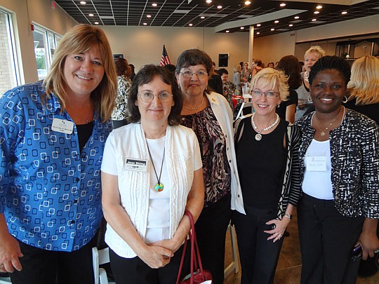 Photo by David Chapman - Vicky Zelen of Zelen Risk Solutions, Jean Shimp of Shimp Sign &amp; Design, Patsy Underwood of Atlantic Laser Office Products, Mary Fisher of Mary Fisher Design and Keisha Cotton of New Perspective Services.