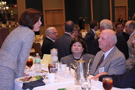 Photo by Joe Wilhelm Jr. - Florida Supreme Court Justice Barbara Pariente spends time with attorney Hamilton "Ham" Cooke and Circuit Judge Karen Cole at The Jacksonville Bar Association meeting Monday at the Hyatt. Pariente was the guest speaker.