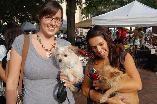 Photos by Max Marbut - Jamie Kouw brought Tonto and Maria Phillips brought Scout to last year's First Wednesday Art Walk Pet Walk. The 2012 edition is 5-9 p.m Wednesday.
