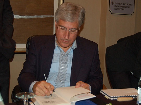 Photos by Max Marbut - Best-selling author Steve Berry signed copies of his latest novel, "The Columbus Affair," Monday at the Omni Hotel after the Rotary Club of Jacksonville meeting.