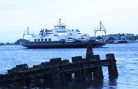 File photo by Joe Wilhelm, Jr. - A crack was found Monday in the hull of the St. Johns River Ferry, ceasing operations for the next several days until repairs are made.