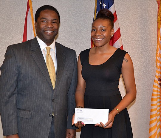 Chanelle Porter, a local student who took part in Mayor Alvin Brown's inaugural Learn2Earn program, has received a $3,550 scholarship check from VyStar Credit Union. The gift will pay for Porter's visit to the High School Presidential Inaugural Confer...