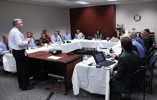 Photo by Joe Wilhelm Jr. - Jacksonville Port Authority CEO Paul Anderson speaks at a meeting of port and City staff and St. Johns River Ferry Commission members Thursday at the port administration building on Talleyrand Avenue.