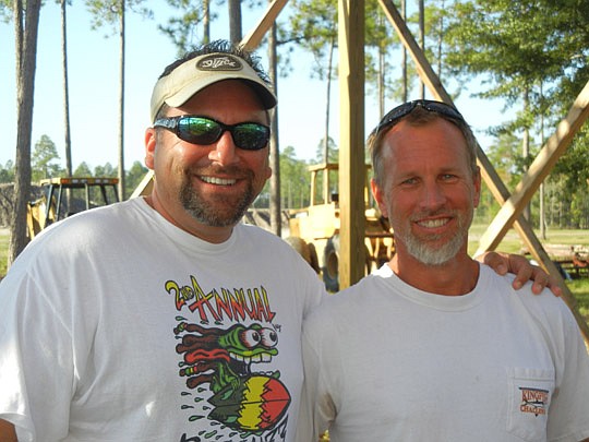 Photo by Karen Brune Mathis - Engineer Anthony Goria, principal of Align Engineering Group Inc., and land owner Wayne Scarborough Jr. are working toward development of the WW Motocross Park on the Scarborough WW Ranch in West Jacksonville.