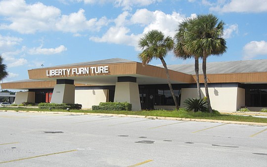 Photo by Karen Brune Mathis - Orlando-based Freshfields Farm bought the former Liberty Furniture building at 5555 University Blvd. W. and wants to rebuild it as a produce and meat market.
