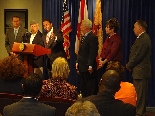 Photo by David Chapman - Mayor Alvin Brown (third from left) on Monday announces a two-day education summit Feb. 28 and March 1 and a goal of raising $2 million for education initiatives. Many education stakeholders attended the announcement including...