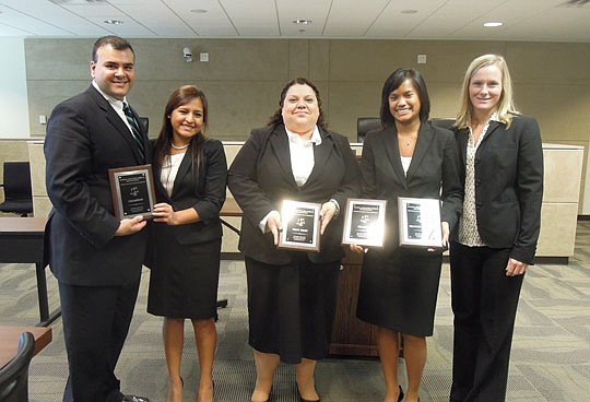 Two Florida Coastal School of Law teams advanced to the final round of The Thomas Tang National Moot Court Regional Competition and earned champion and finalist honors. From left, the team of Rishi Pattni and Nina Carro won the regional championship, ...