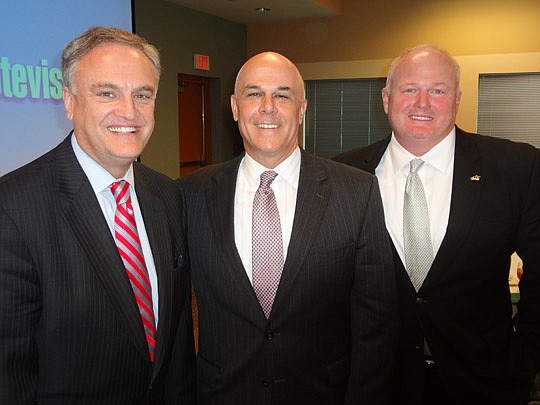 Photo by David Chapman - Baptist Health CEO Hugh Greene, Florida Blue CEO and Chairman Patrick Geraghty and Economic Roundtable of Jacksonville board member Earnie Franklin. Greene and Geraghty were the keynote speakers of the roundtable's Wednesday f...