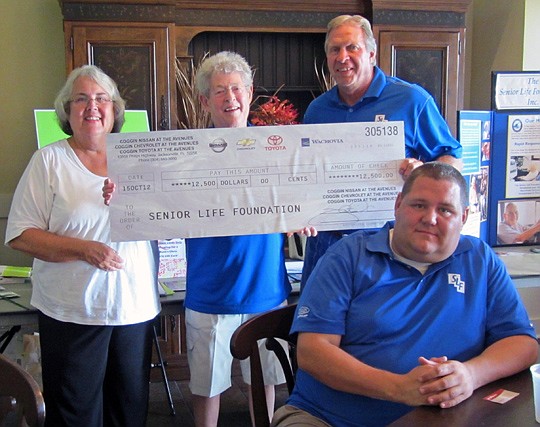 Coggin Chevrolet at The Avenues presented a check for $12,500 to the Senior Life Foundation Inc., the proceeds from the company's 2nd annual charity golf tournament. Above from left: Mary Grimm, foundation vice president of development; Mari Terbruegg...