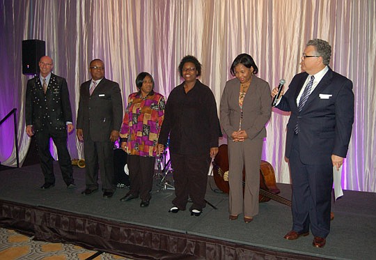 Photos by Max Marbut - The Omni celebrated its 25th anniversary Downtown with a reception Thursday evening at the hotel. Staff members who have worked at the hotel since it opened, from left, Bryan Ayer, Eric Brown, Blanche Ephron, Pearliey Hodges and...