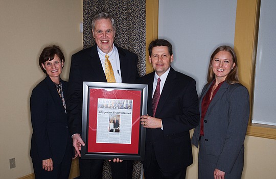  The Clay County Bar Association celebrated Judge McCarthy "Mack" Crenshaw Jr.'s 20 years of service during a retirement reception Nov. 8 at the Country Club of Orange Park. From left, LaRae Hendrix, Crenshaw, Clay Bar President John Fagan and Alison ...