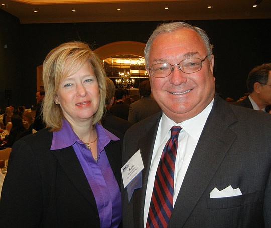Photo by Karen Brune Mathis - Former JAX Chamber Chairs Kelly Madden and Ron Autrey before the JAXUSA Partnership meeting Thursday. Madden will chair the search committee to replace retiring President Wally Lee.