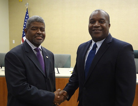 Photo by David Chapman - Michael Blaylock, outgoing Jacksonville Transportation Authority executive director, with his successor Nathaniel Ford.