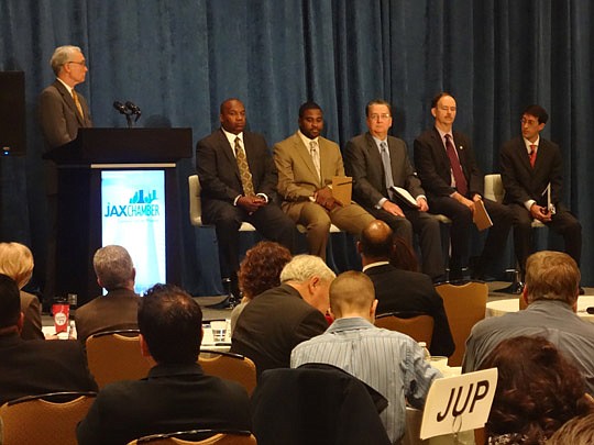 Photo by David Chapman - A regional panel discussing energy issues Thursday at the Hyatt Downtown was moderated by Charley Hood, Rayonier vice president of government relations, and consisted of (seated from left) Nathaniel Ford, JTA executive directo...