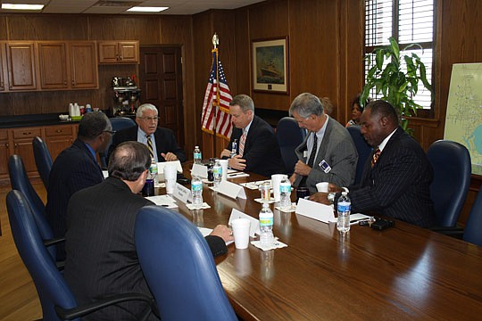 Photo by Joe Wilhelm Jr. - Clockwise from the head of the table, Jacksonville Port Authority Board Chairman Jim Citrano, Vice Chairman Joe York, Treasurer John Anderson, member John Newman, City Council liaison Jim Love and member Reginald Gaffney. Bo...